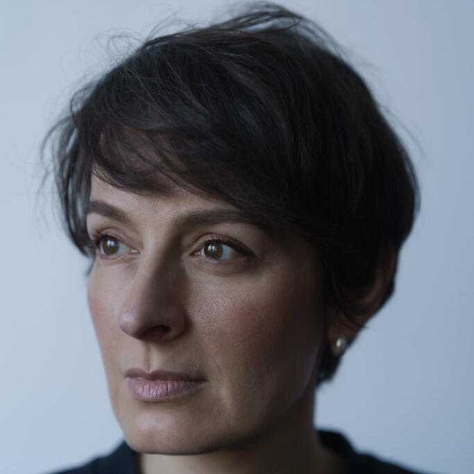 Sylwia photographed from half-profile, with a natural light.