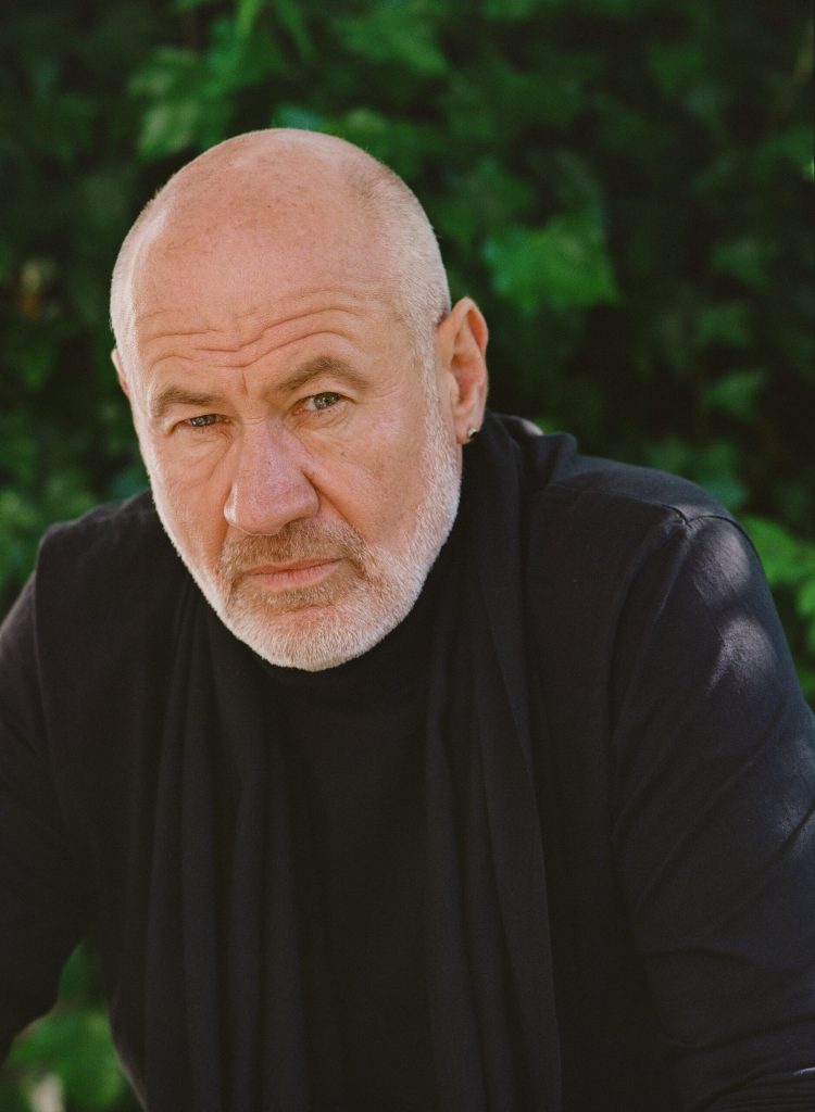 Photograph of Fish in his garden